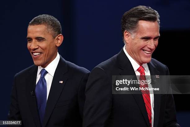 Democratic presidential candidate, U.S. President Barack Obama walks away from Republican presidential candidate, former Massachusetts Gov. Mitt...