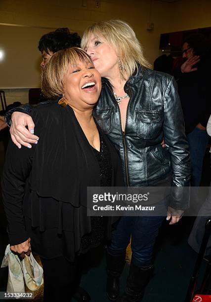 Mavis Staples and Lucinda Williams backstage at the "Love For Levon" Benefit To Save The Barn at Izod Center on October 3, 2012 in East Rutherford,...