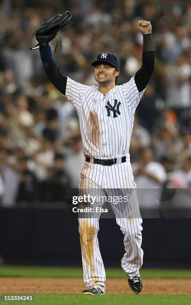 Nick Swisher of the New York Yankees celebrates the win over the Boston Red Sox on October 3, 2012 at Yankee Stadium in the Bronx borough of New York...