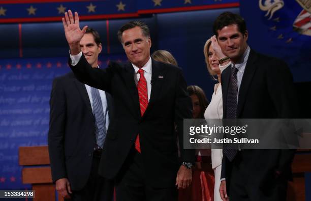 Republican presidential candidate, former Massachusetts Gov. Mitt Romney waves as he stands with his wife, Ann Romney as son's Matt Romney and Josh...