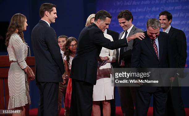 Republican presidential candidate, former Massachusetts Gov. Mitt Romney and his wife, Ann Romney stand with their family after the Presidential...