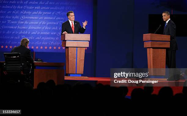 Republican presidential candidate, former Massachusetts Gov. Mitt Romney speaks as Democratic presidential candidate, U.S. President Barack Obama...