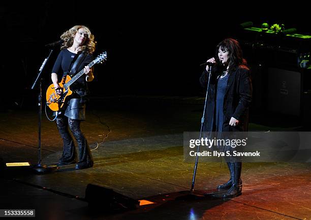 Nancy Wilson and Ann Wilson of the band Heart perform at Beacon Theatre on October 3, 2012 in New York City.