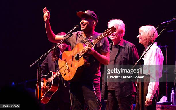 Musician Tom Morello and mother Mary Morello seen onstage in support of the No On Proposition 32 Concert at Nokia Theatre LA Live on October 3, 2012...