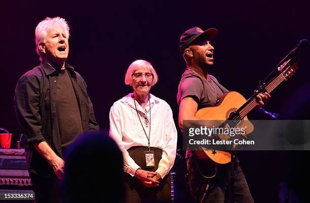 Musician Graham Nash of Crosby, Stills & Nash, Musician Tom Morello and Mary Morello seen onstage in support of the No On Proposition 32 Concert at...