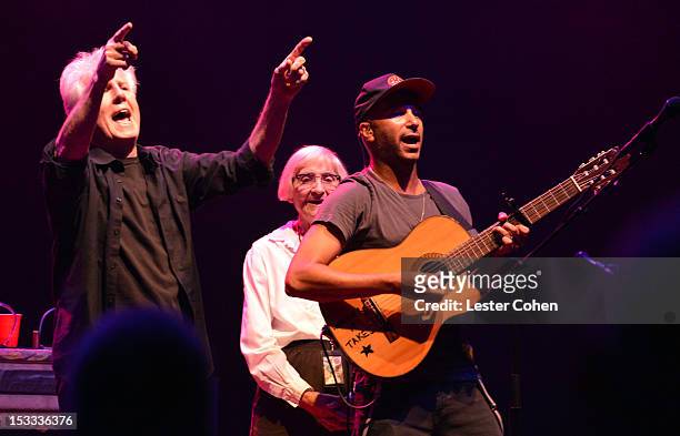 Musician Graham Nash of Crosby, Stills & Nash, Musician Tom Morello and Mary Morello seen onstage in support of the No On Proposition 32 Concert at...