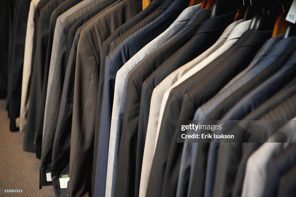 Men's suit jackets in clothing store