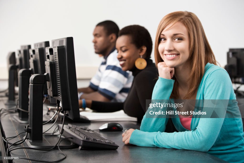 Students sitting together in computer lab
