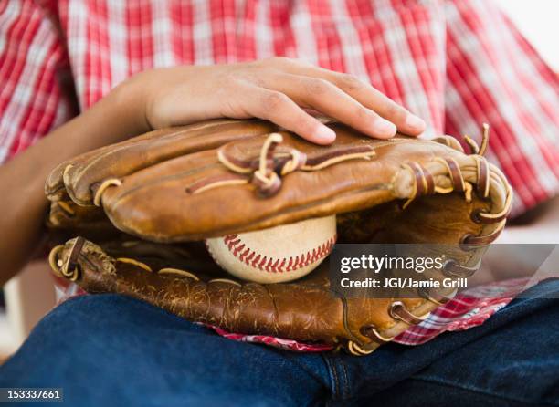 african american boy holding baseball and glove - baseball glove stock pictures, royalty-free photos & images