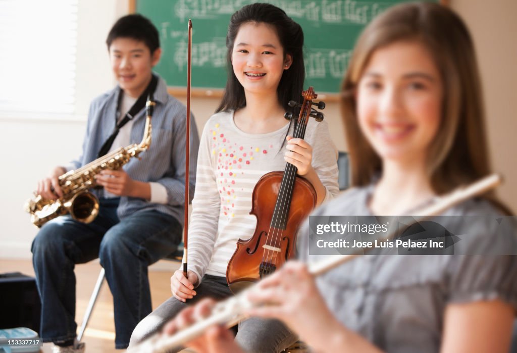 Students playing musical instruments