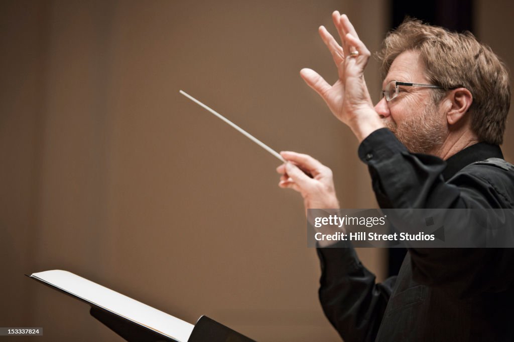 Conductor leading orchestra