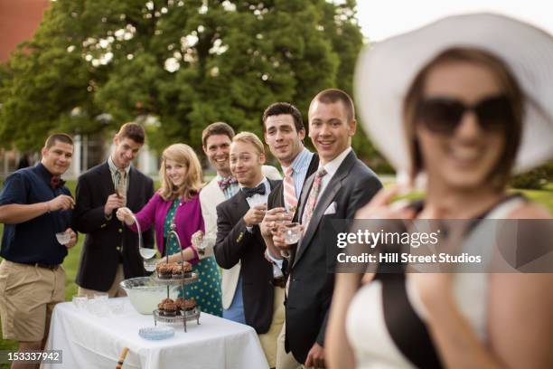 elegant friends having a party on the lawn - summer cocktails garden party drinks bildbanksfoton och bilder