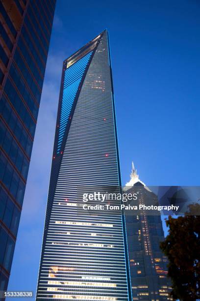 modern highrise against sky - shanghai world financial center stock pictures, royalty-free photos & images