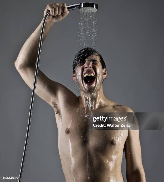 caucasian man taking a shower - thorax stock pictures, royalty-free photos & images