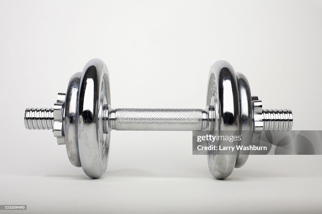 A shiny silver dumbbell