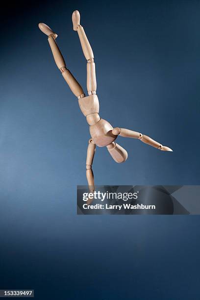 an upside down artist's figure falling in mid-air - lay figure stock pictures, royalty-free photos & images