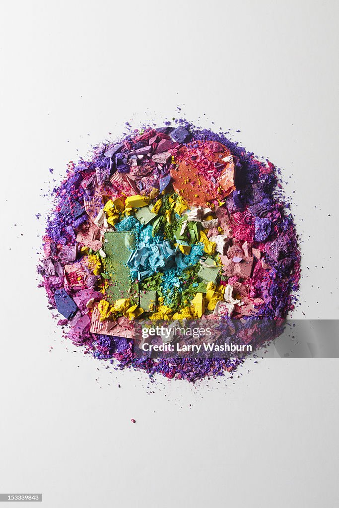 Crushed various make-up powders arranged into a circle
