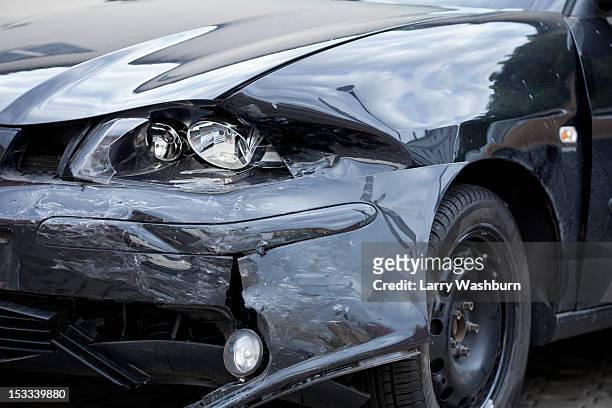 damaged car with distorted reflection of town - damaged car stock pictures, royalty-free photos & images