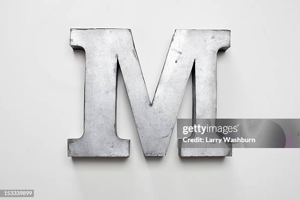 metal letter m - western script font stock pictures, royalty-free photos & images