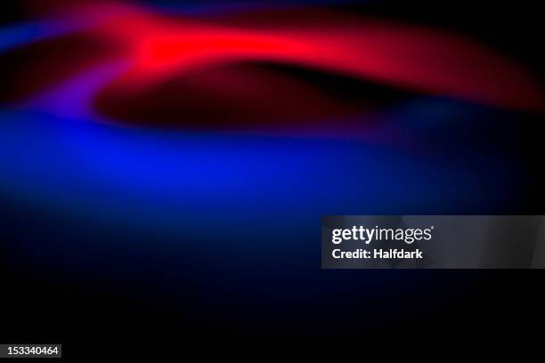 abstract patterns of blue and red light on a black background - red glow stock pictures, royalty-free photos & images