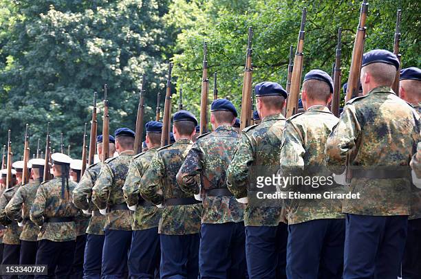 german bundeswehr parading - armed forces stock-fotos und bilder
