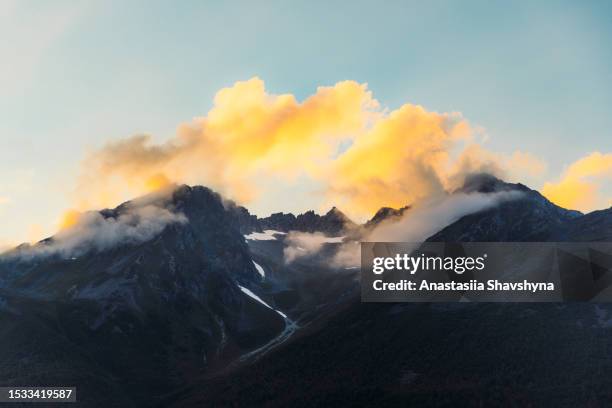 sunset over idyllic fjord in sunnmøre alps, norway - alesund noorwegen stock pictures, royalty-free photos & images