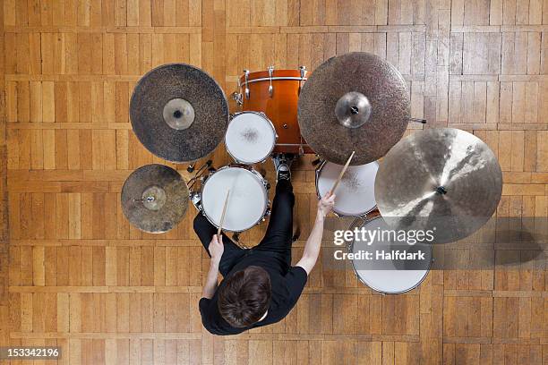 drummer playing kit - hitting drum stock pictures, royalty-free photos & images