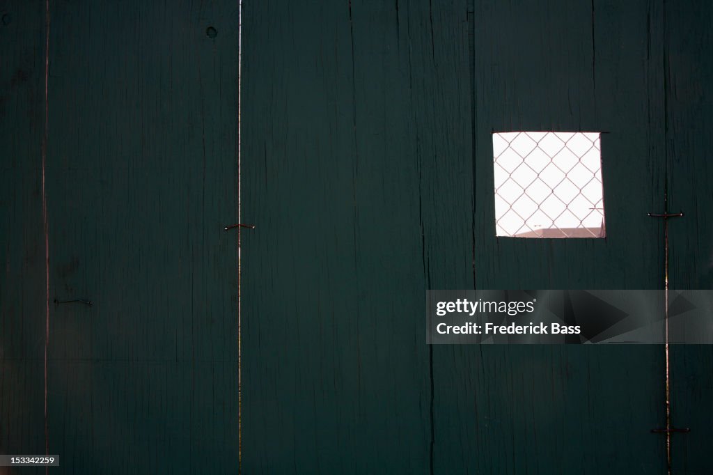 Forced perspective of small wire mesh section of fence