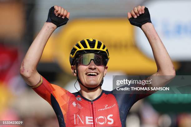 Grenadiers' Spanish rider Carlos Rodriguez Cano cycles to the finish line to win the 14th stage of the 110th edition of the Tour de France cycling...