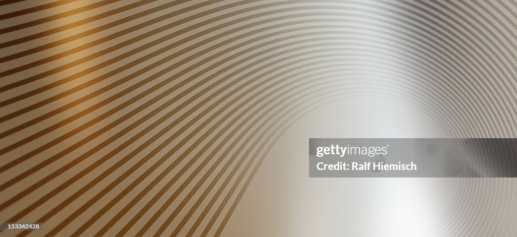 Detail of curved lines against an abstract background