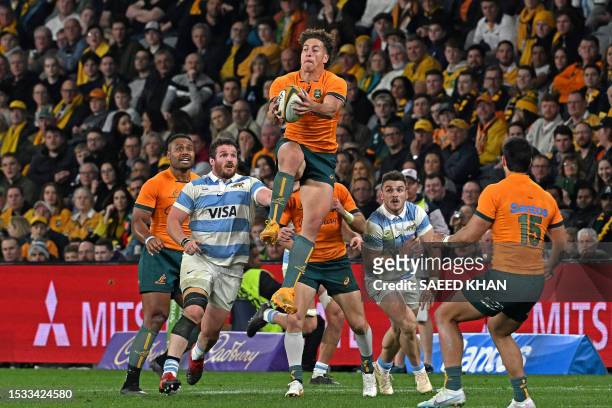 Australias Mark Nawaqanitawase catches the ball during the Rugby Championship match between Argentina and Australia at Commbank Stadium in Sydney on...