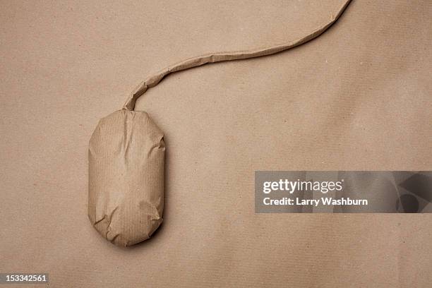 a computer mouse wrapped in brown paper - wrapping paper stock pictures, royalty-free photos & images