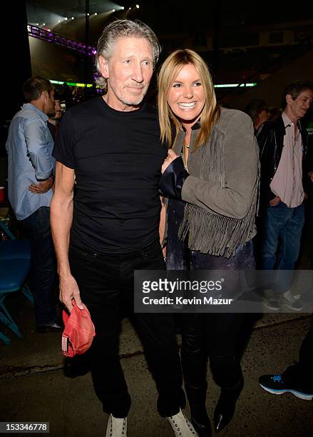 Roger Waters and Grace Potter backstage at the "Love For Levon" Benefit To Save The Barn at Izod Center on October 3, 2012 in East Rutherford, New...