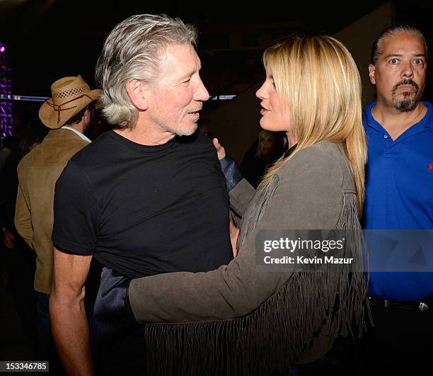 Roger Waters and Grace Potter backstage at the "Love For Levon" Benefit To Save The Barn at Izod Center on October 3, 2012 in East Rutherford, New...