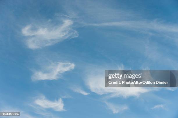 wispy clouds in sky - cirrus stock pictures, royalty-free photos & images