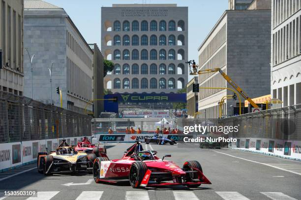 Sacha Fenestraz of France and Nissan, Rene Rast of Germany and Neom McLaren Formula E and other drivers compete in race 1 during Formula E 2023 Rome...