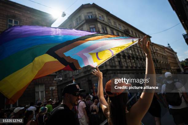 July 2023, Hungary, Budapest: People take part in the Pride parade in Budapest. For the past two years, Hungary has had a so-called "child protection...