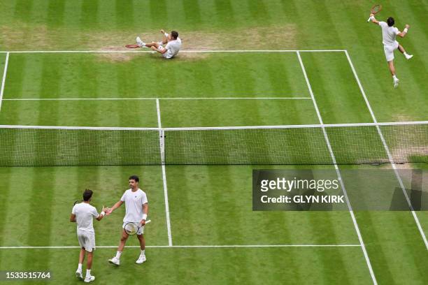Britain's Neal Skupski and Netherlands' Wesley Koolhof celebrate beating Spain's Marcel Granollers and Argentina's Horacio Zeballosduring their men's...