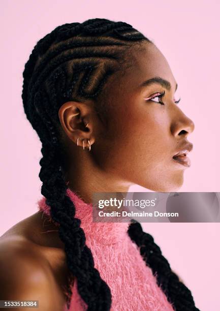 monochromatic pink beauty shot . stock photo - pigtails stock pictures, royalty-free photos & images