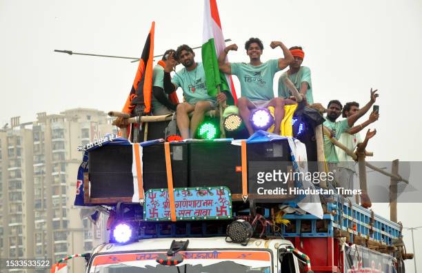 Thousands of Dak Kanwars throng at Delhi-Meerut Expressway on the penultimate day of Kanwar yatra, on July 15, 2023 in Ghaziabad, India.
