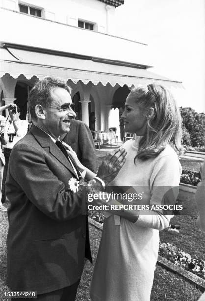 Henri-Georges Clouzot et Ursula Andress lors du Festival ce Cannes en mai 1965