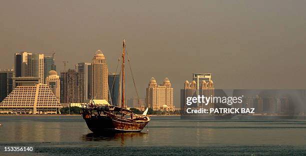 Dhow is moored off the Qatari capital Doha, on October 4, 2012. Formerly a British protectorate, Qatar has been ruled as a unicameral federal...