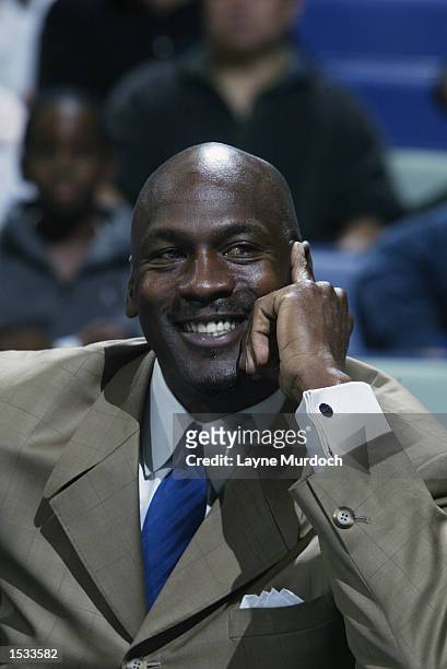 Michael Jordan of the Washington Wizards looks on during a preseason game against the New Orleans Hornets on October 17, 2002 at New Orleans Arena in...
