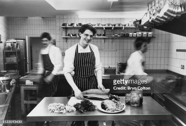 British chef Marco Pierre White preparing food in the kitchen at Harveys restaurant, Wandsworth, London, February 26th, 1987.