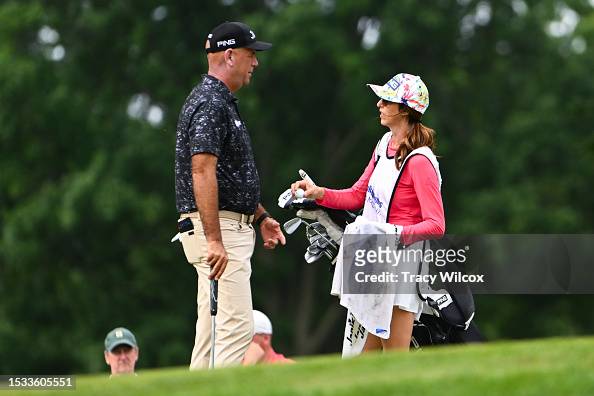 Stewart Cink with his wife/caddie, Lisa at the first green during the ...