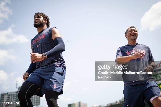 Kenley Jansen of the Boston Red Sox works out with strength and conditioning coach Kiyoshi Mimose before a game against the Chicago Cubs on July 15,...