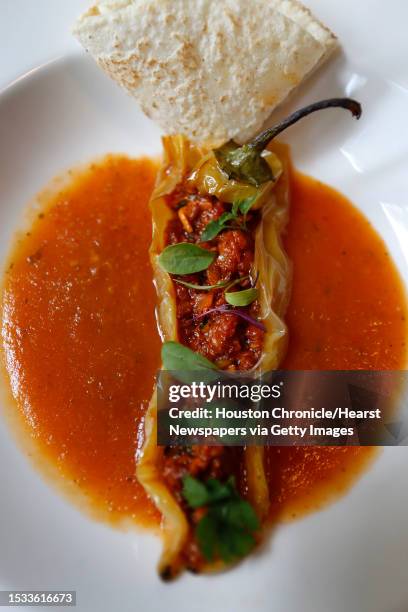 Chile Xcatic Relleno, Picadillo-stuffed roasted banana pepper on rustic tomato broth Friday, Aug. 28 in Houston. Next week La Fisheria restaurant...