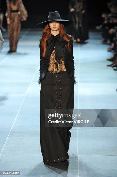 Model walks the runway at the Saint Laurent Spring Summer 2013 fashion show during Paris Fashion Week on October 1, 2012 in Paris, France.