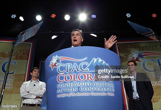 Republican presidential candidate, former Massachusetts Gov. Mitt Romney speaks as his sons Matt Romney and Josh Romney look on during the regional...