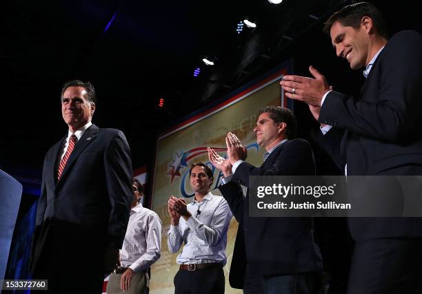Republican presidential candidate, former Massachusetts Gov. Mitt Romney speaks as his sons Matt Romney, Craig Romney, Tagg Romney and Josh Romney...